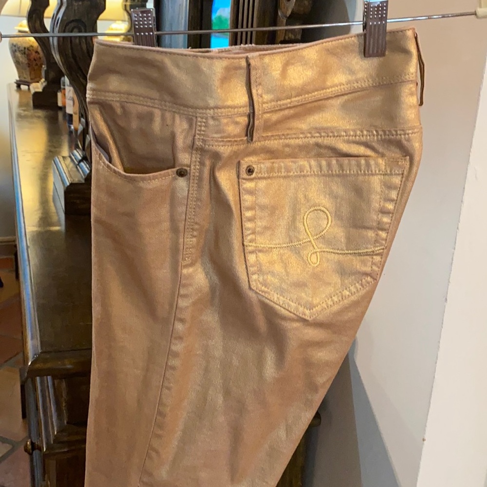 Lilly Pulitzer shimmery gold skinny jeans.